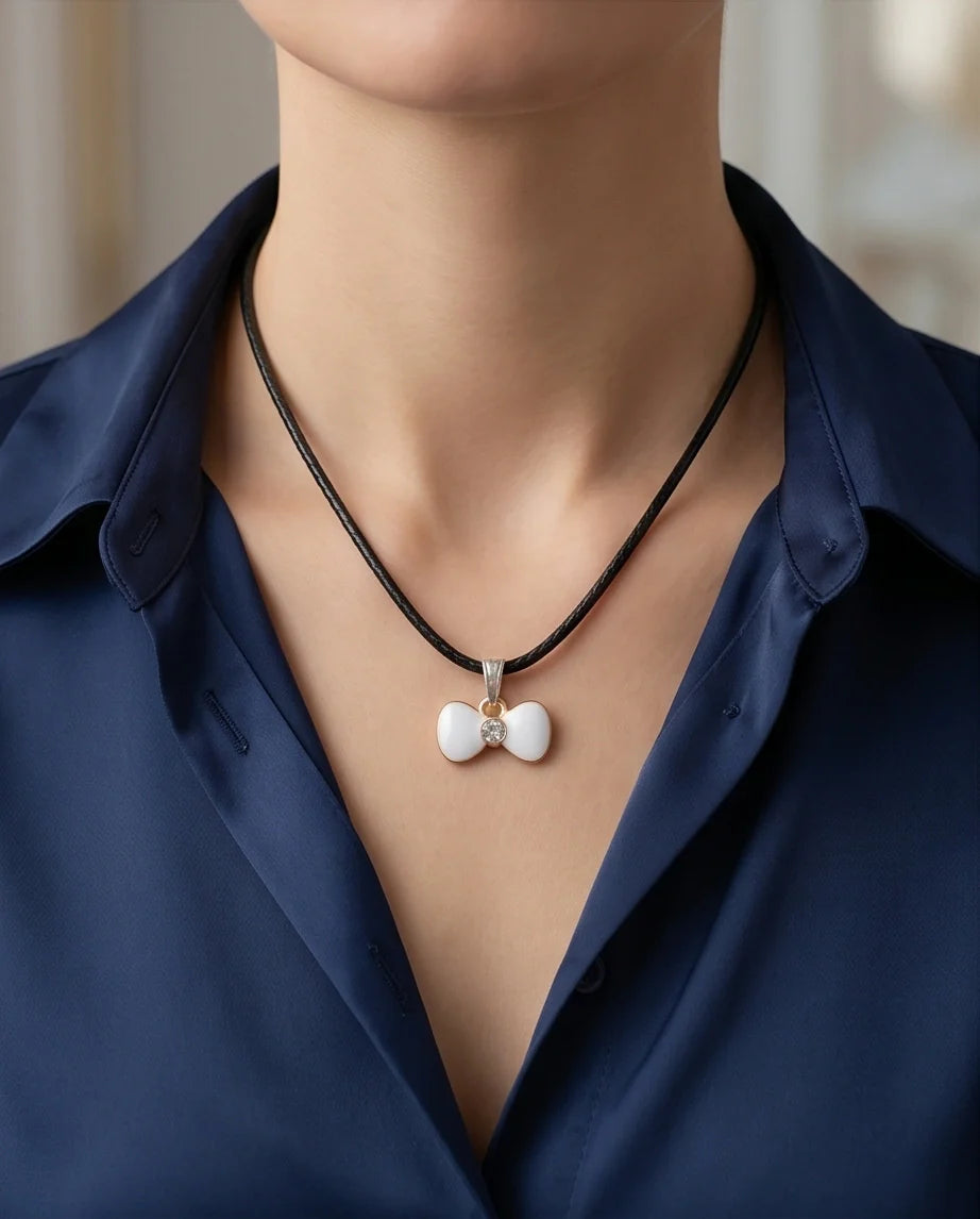 Gold and White Bow Tie Pendant Necklace