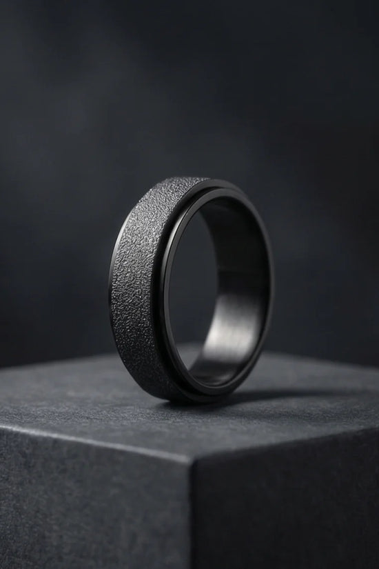The Obsidian Void: Sandblasted Black Spinner Band