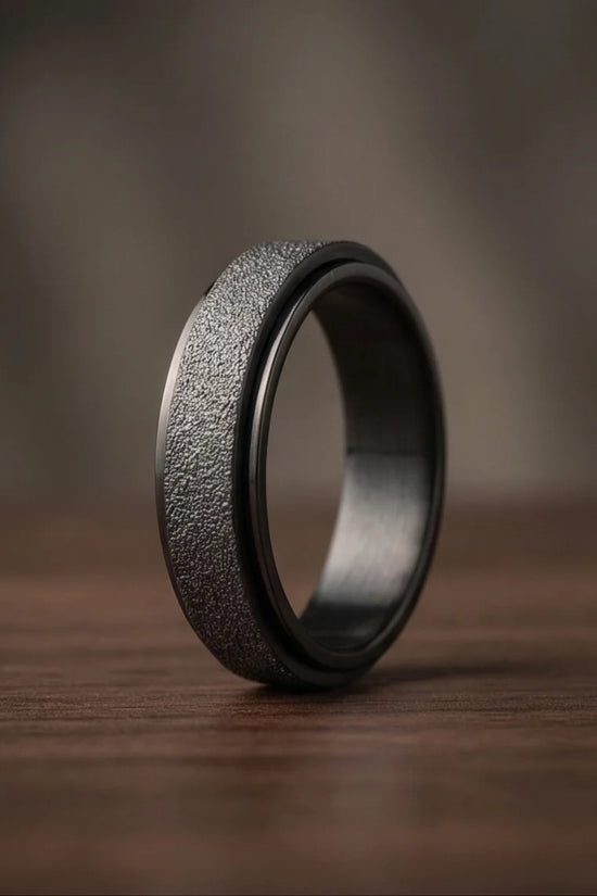 The Obsidian Void: Sandblasted Black Spinner Band