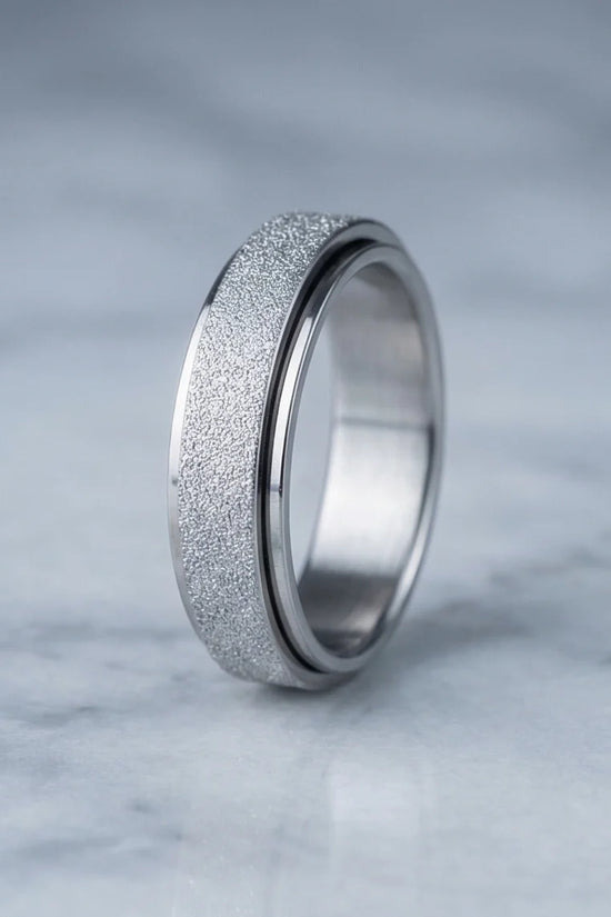 The Stardust Sentinel: Frosted Silver Spinner Band