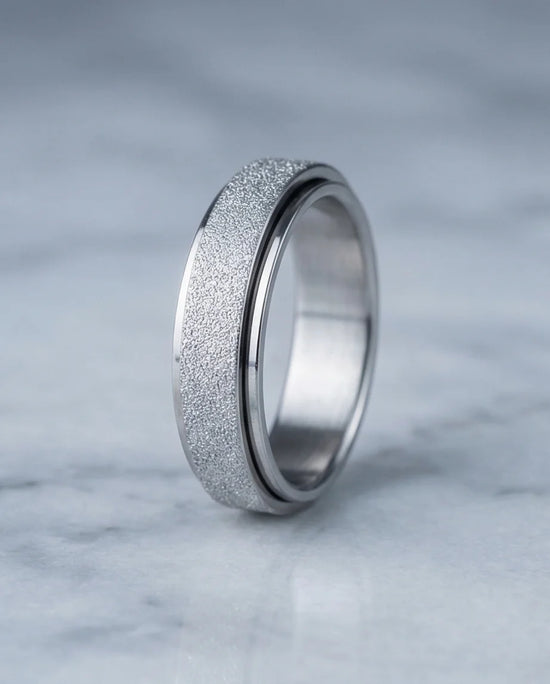 The Stardust Sentinel: Frosted Silver Spinner Band