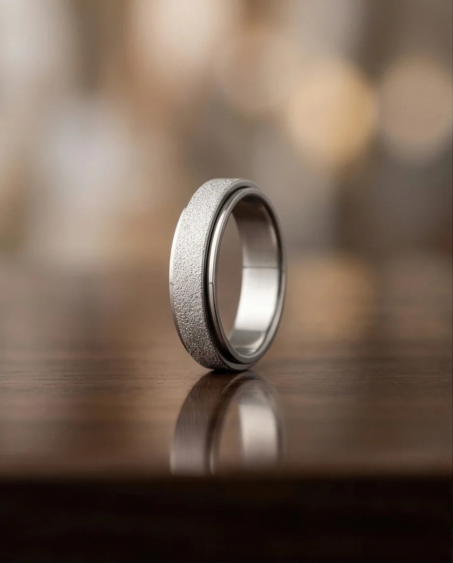 The Stardust Sentinel: Frosted Silver Spinner Band