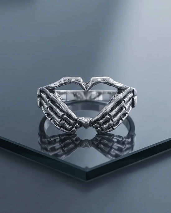 Eternal Embrace: Skeleton Heart Hands Ring