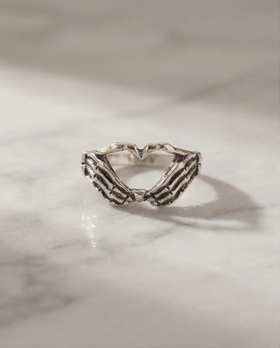 Eternal Embrace: Skeleton Heart Hands Ring