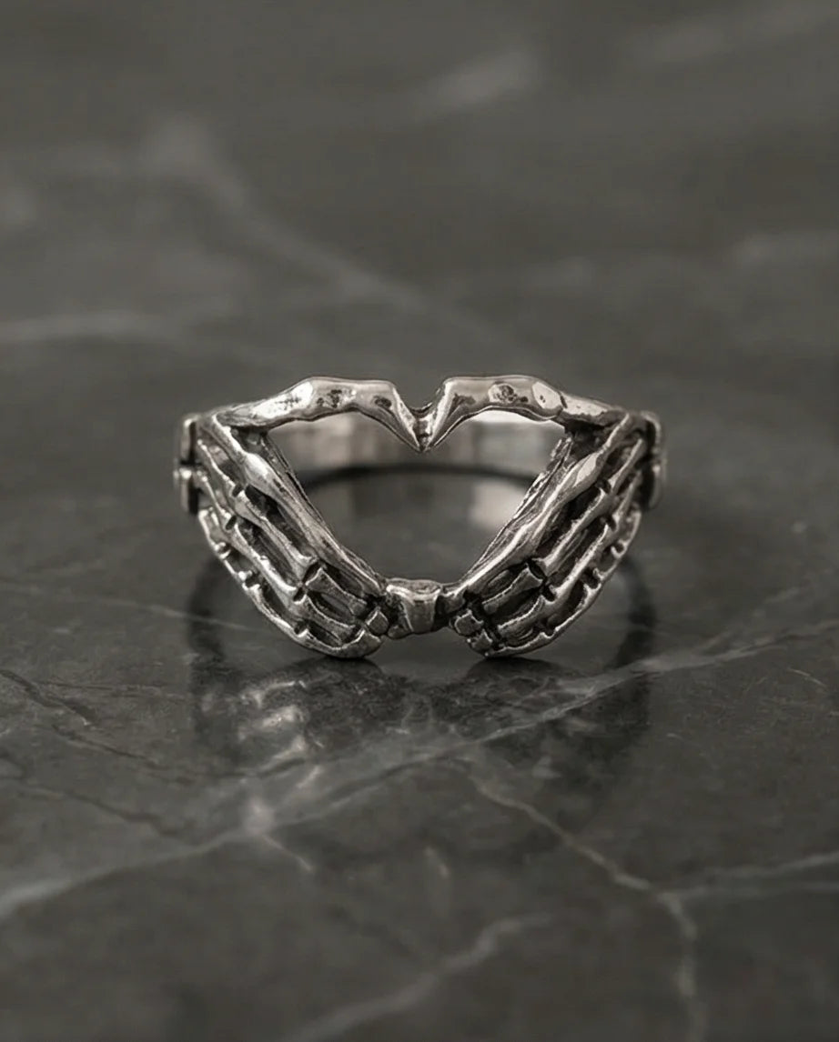 Eternal Embrace: Skeleton Heart Hands Ring