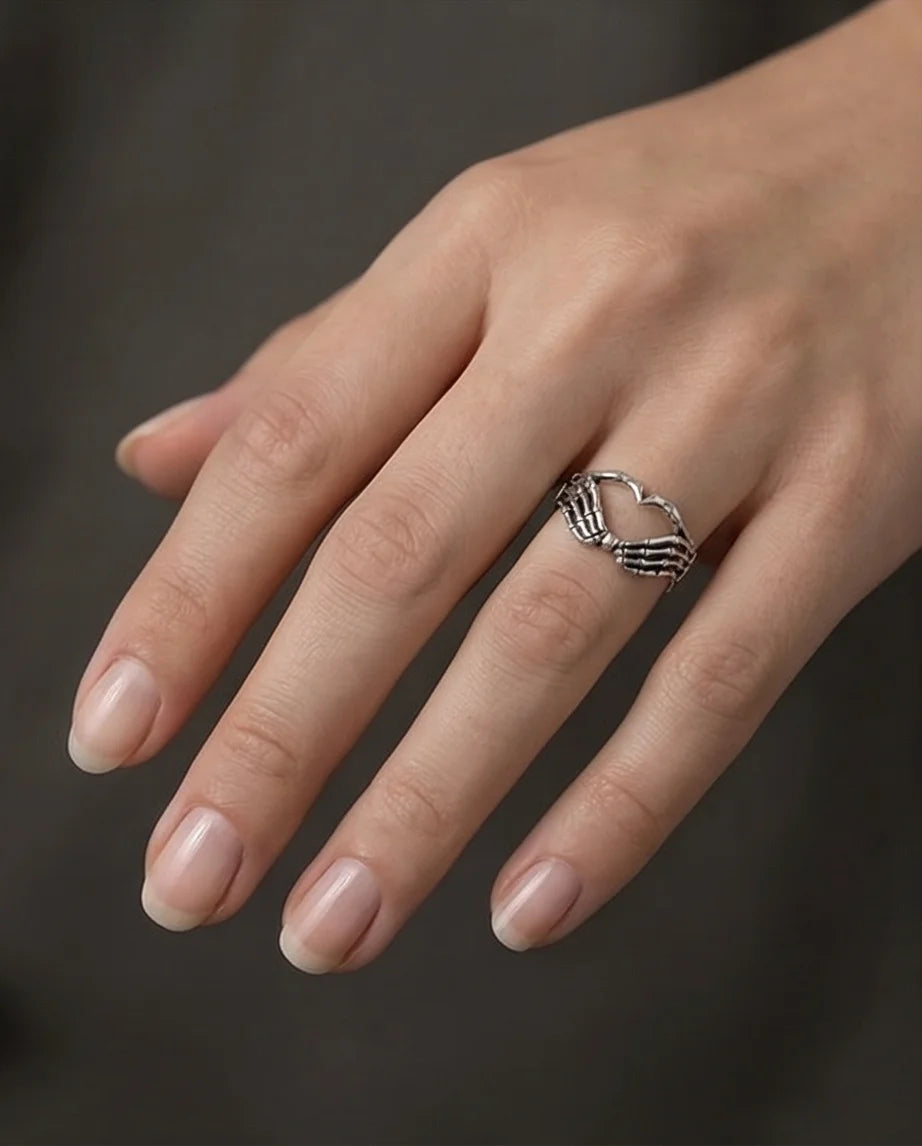 Eternal Embrace: Skeleton Heart Hands Ring