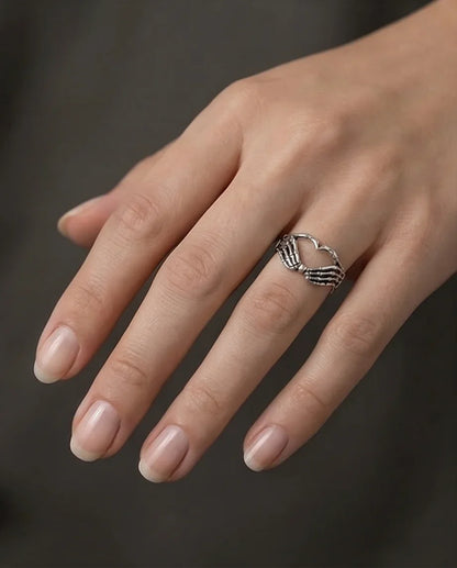 Eternal Embrace: Skeleton Heart Hands Ring