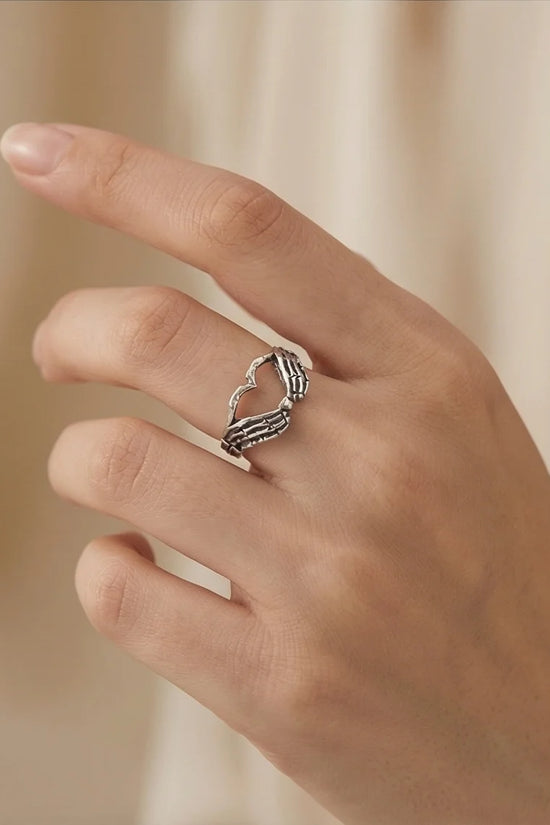 Eternal Embrace: Skeleton Heart Hands Ring
