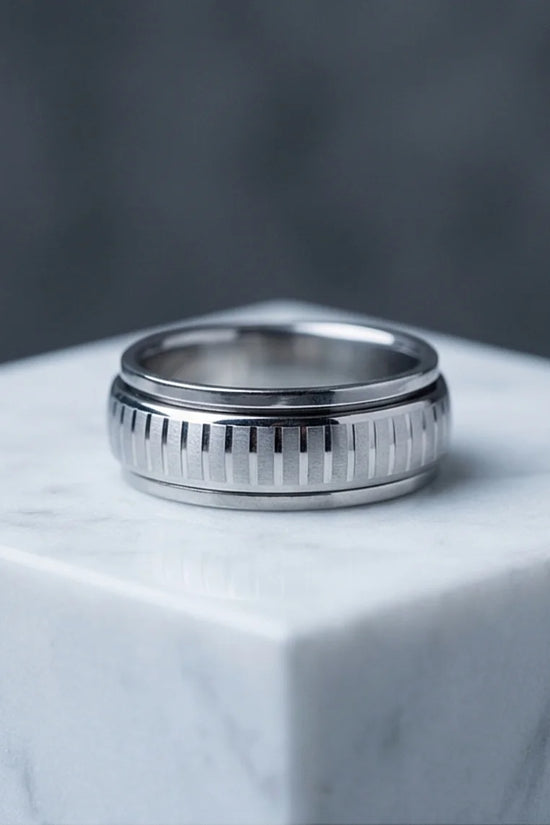 The Kinetic Gear: Industrial Silver Spinner Band