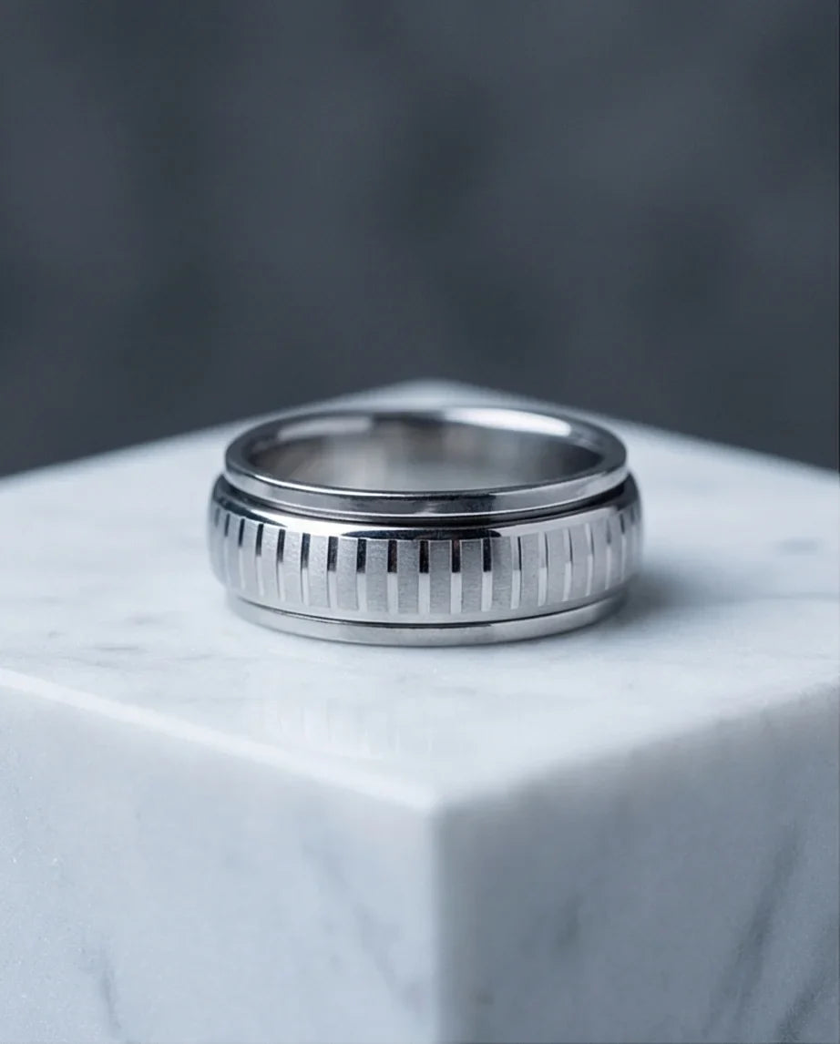 The Kinetic Gear: Industrial Silver Spinner Band