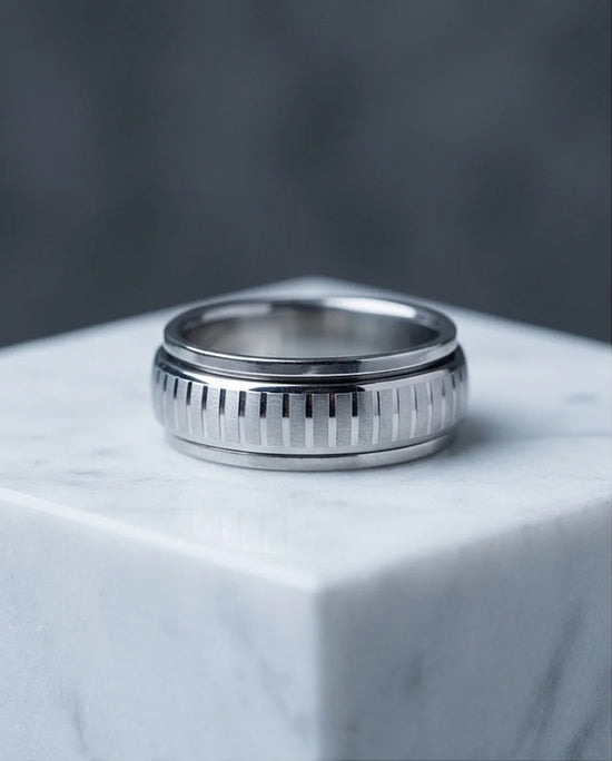 The Kinetic Gear: Industrial Silver Spinner Band