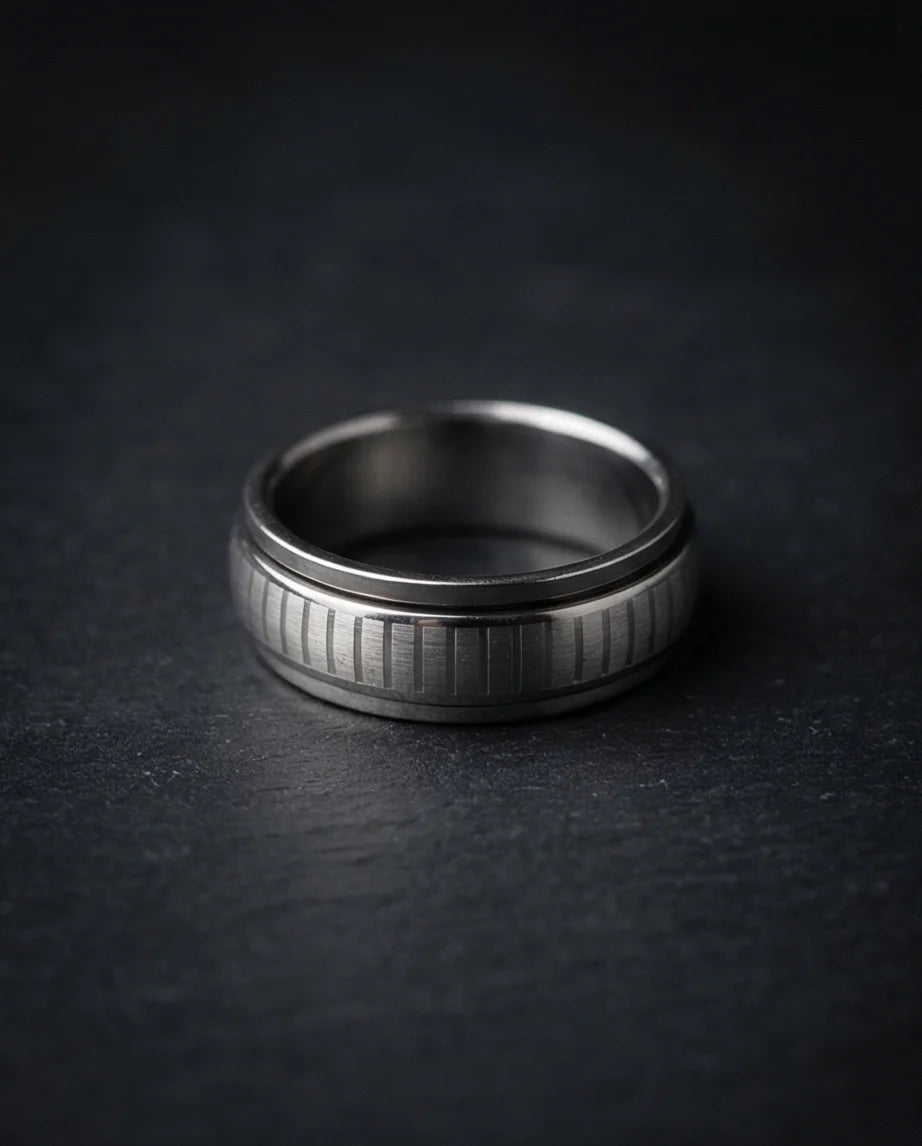 The Kinetic Gear: Industrial Silver Spinner Band