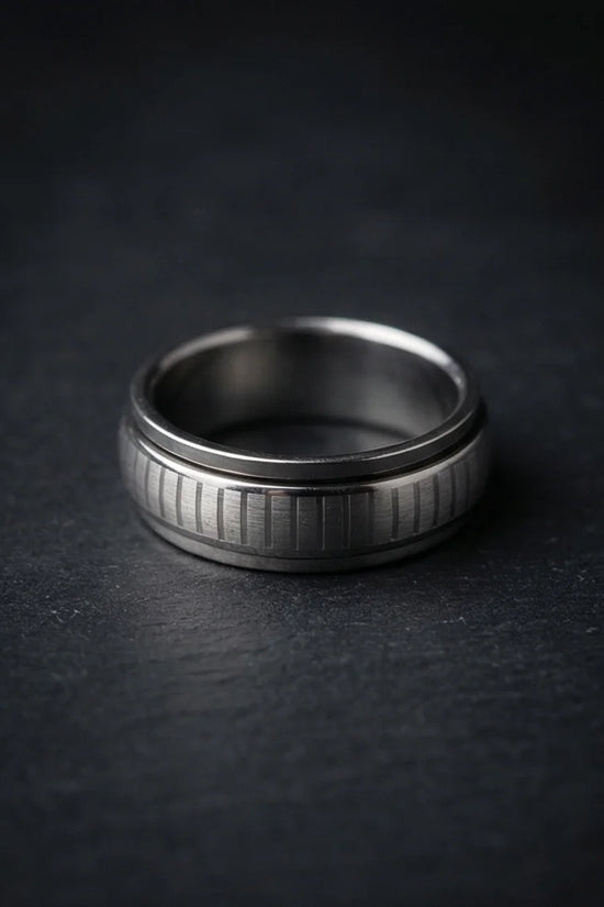 The Kinetic Gear: Industrial Silver Spinner Band