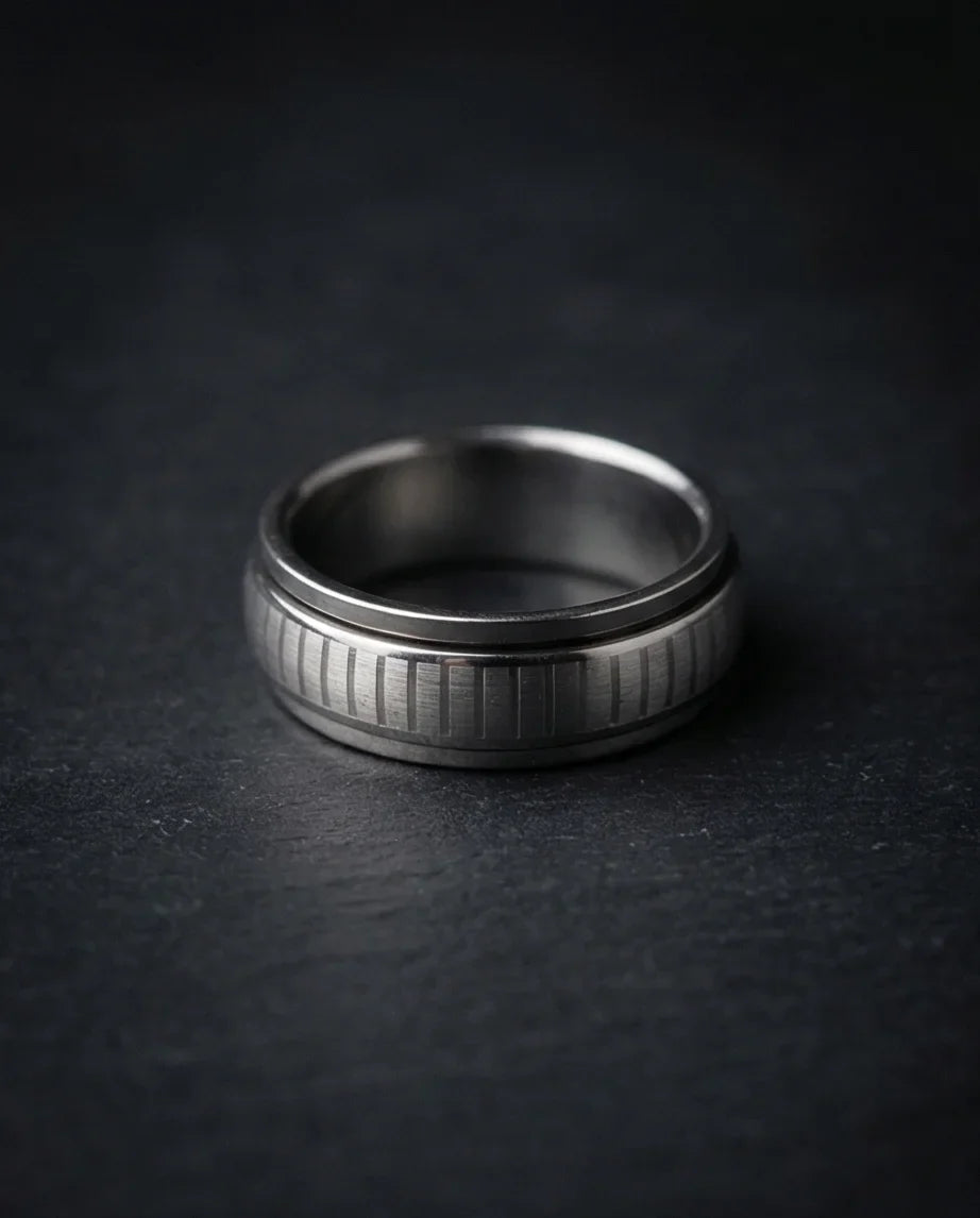 The Kinetic Gear: Industrial Silver Spinner Band