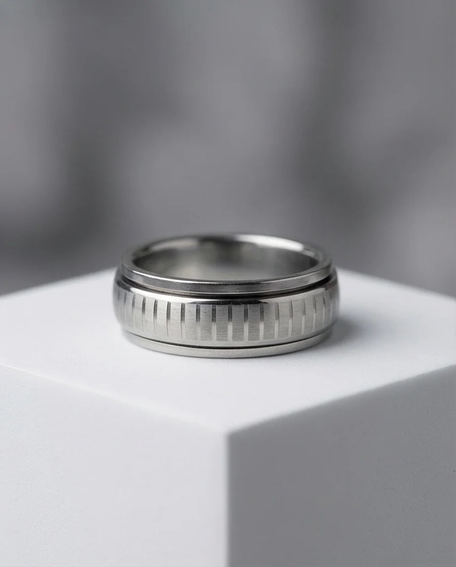 The Kinetic Gear: Industrial Silver Spinner Band