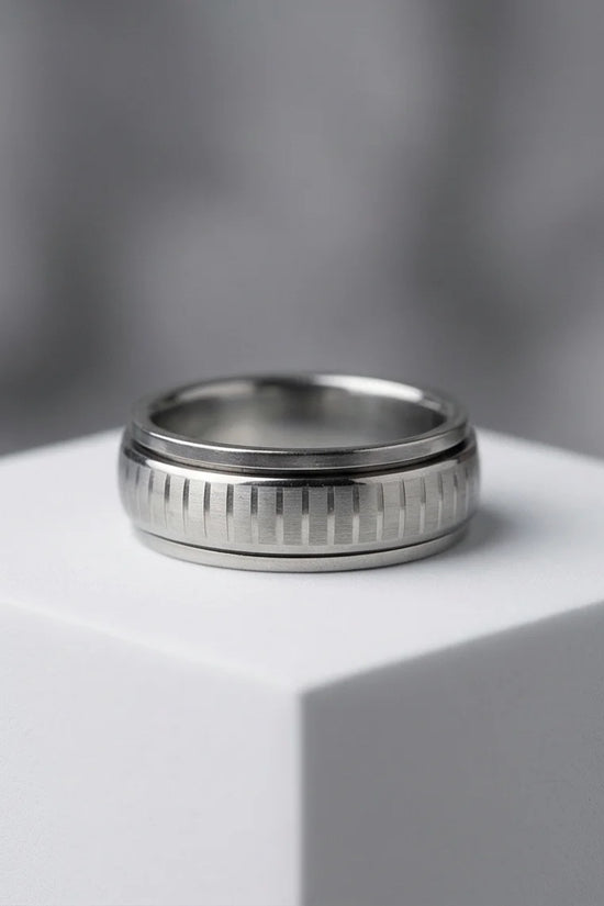 The Kinetic Gear: Industrial Silver Spinner Band