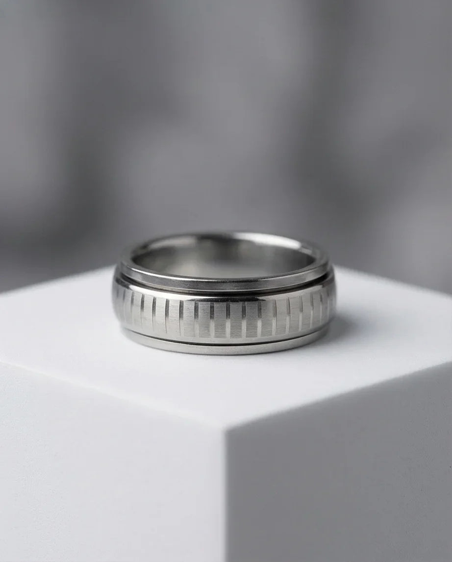 The Kinetic Gear: Industrial Silver Spinner Band