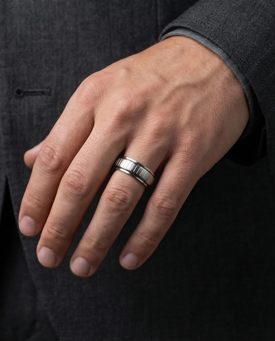 The Kinetic Gear: Industrial Silver Spinner Band