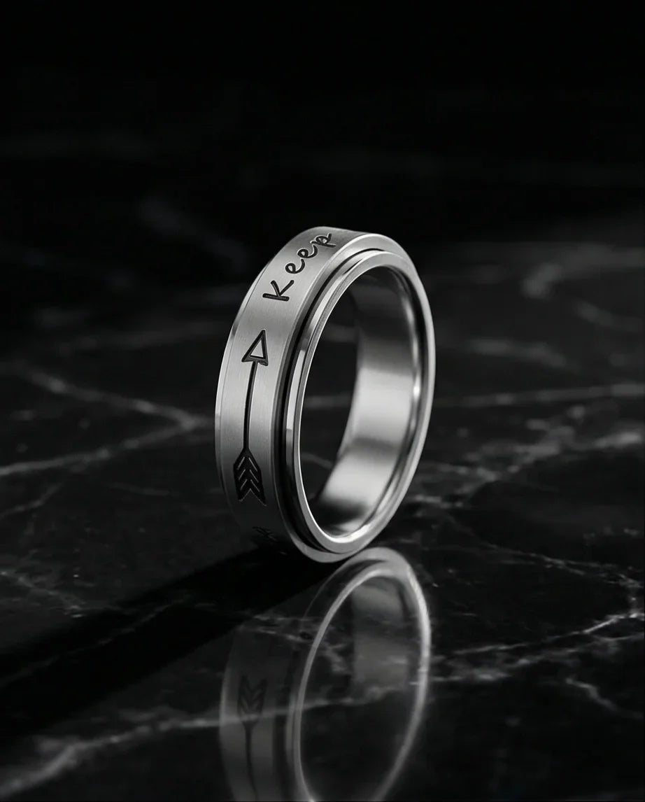 The Momentum Band: "Keep Going" Arrow Spinner