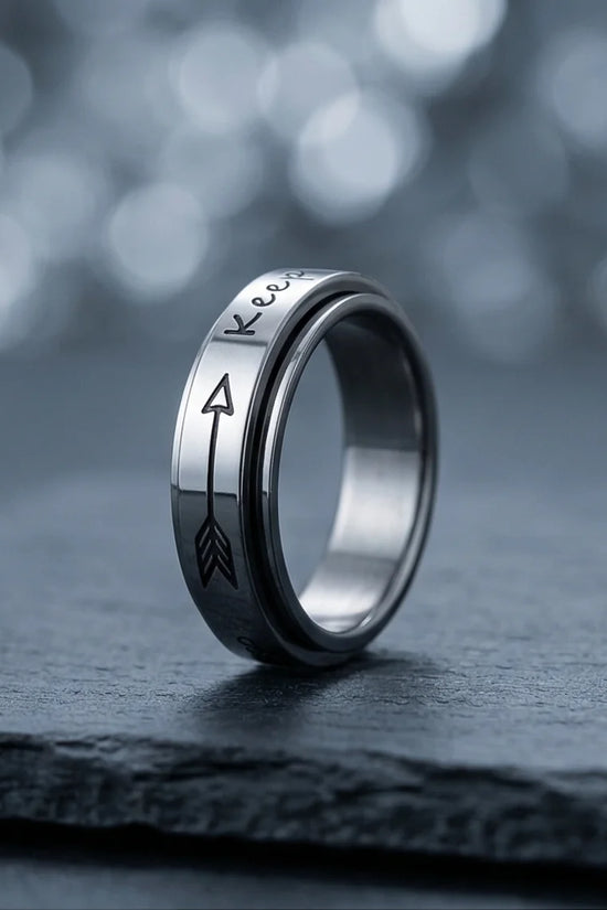 The Momentum Band: "Keep Going" Arrow Spinner