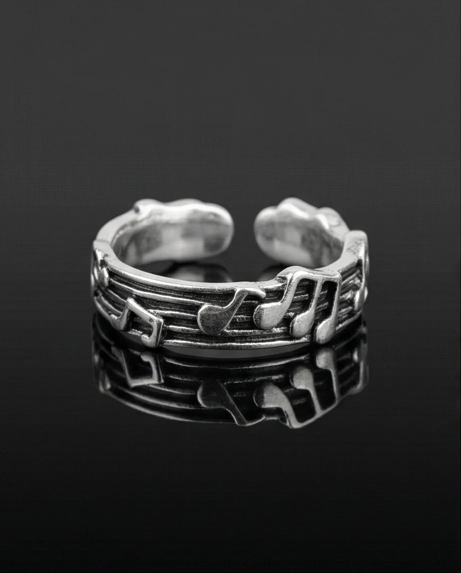 The Melodic Echo: Antique Silver Musical Note Band