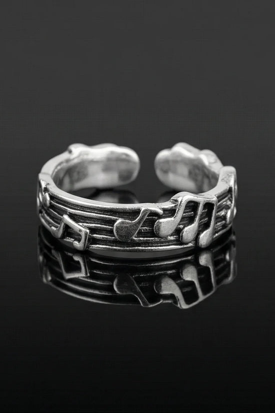 The Melodic Echo: Antique Silver Musical Note Band