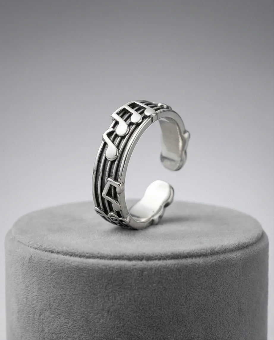 The Melodic Echo: Antique Silver Musical Note Band