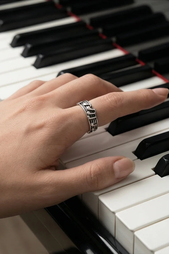 The Melodic Echo: Antique Silver Musical Note Band