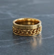 Aurelian Axis: Polished Gold-Tone Fidget Band