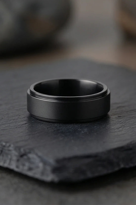 The Obsidian Tier: Stepped Matte Black Band