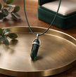 The Emerald Obelisk: Mystic Green Crystal Pendant