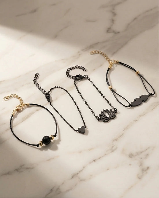The Obsidian Bloom: 4-Piece Minimalist Bracelet Set