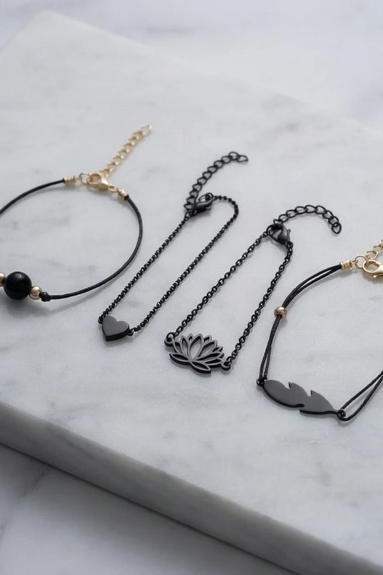 The Obsidian Bloom: 4-Piece Minimalist Bracelet Set