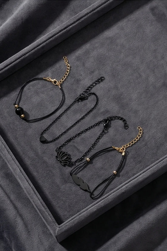 The Obsidian Bloom: 4-Piece Minimalist Bracelet Set