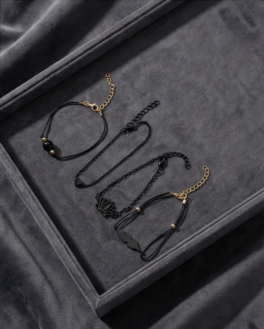The Obsidian Bloom: 4-Piece Minimalist Bracelet Set