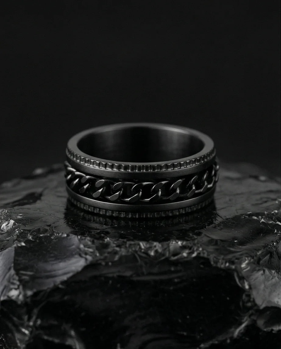 The Obsidian Kinetic: Industrial Chain Spinner Band