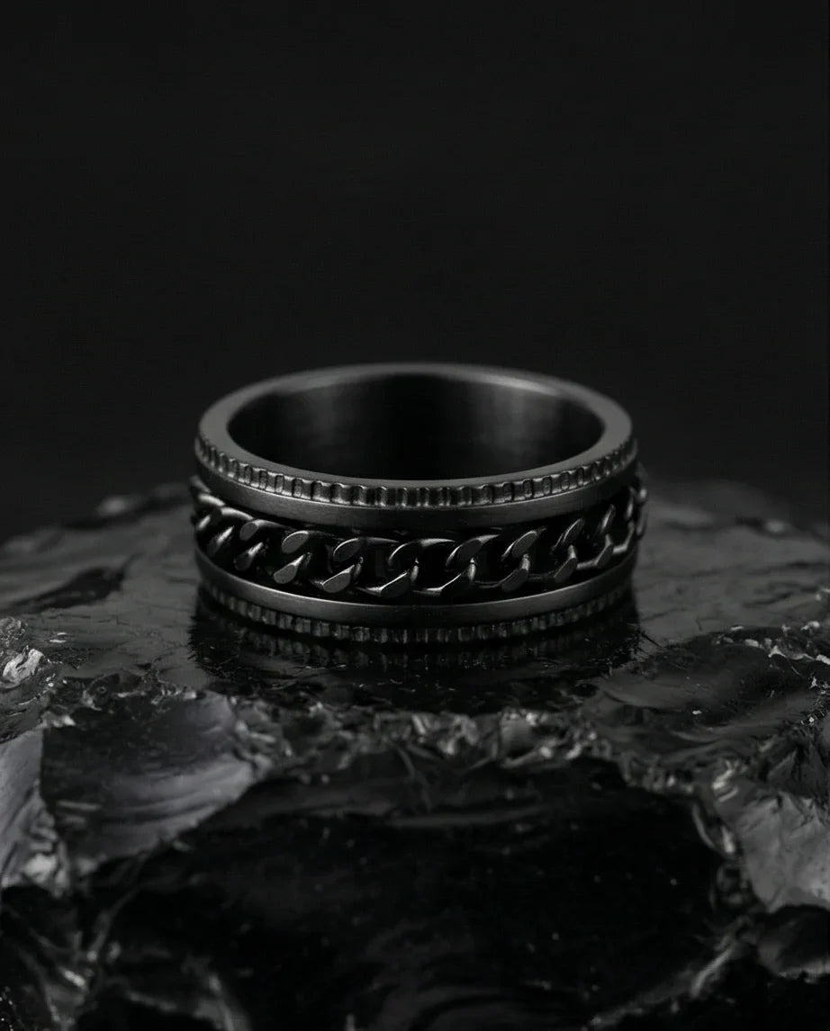 The Obsidian Kinetic: Industrial Chain Spinner Band