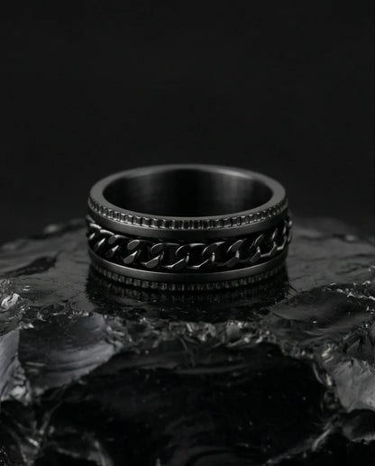 The Obsidian Kinetic: Industrial Chain Spinner Band