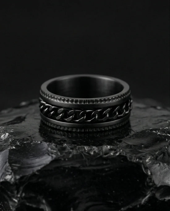 The Obsidian Kinetic: Industrial Chain Spinner Band