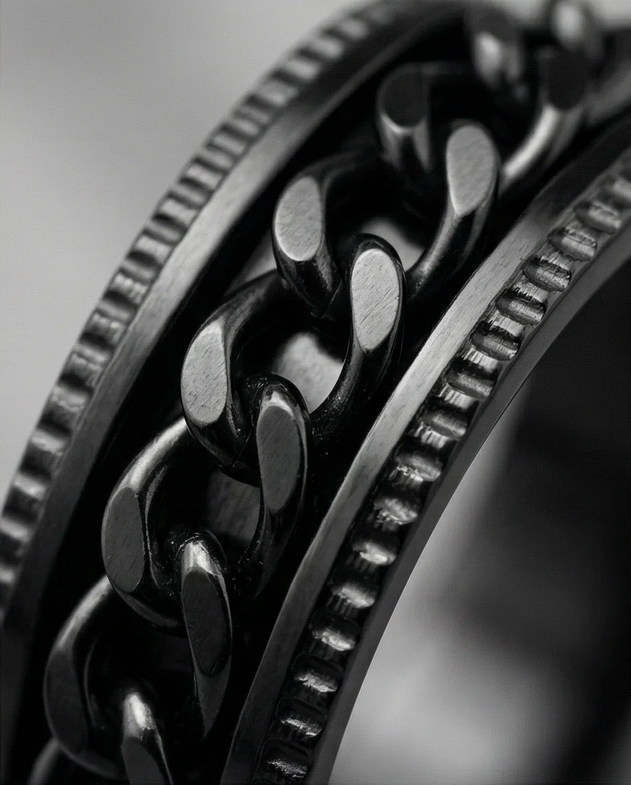 The Obsidian Kinetic: Industrial Chain Spinner Band