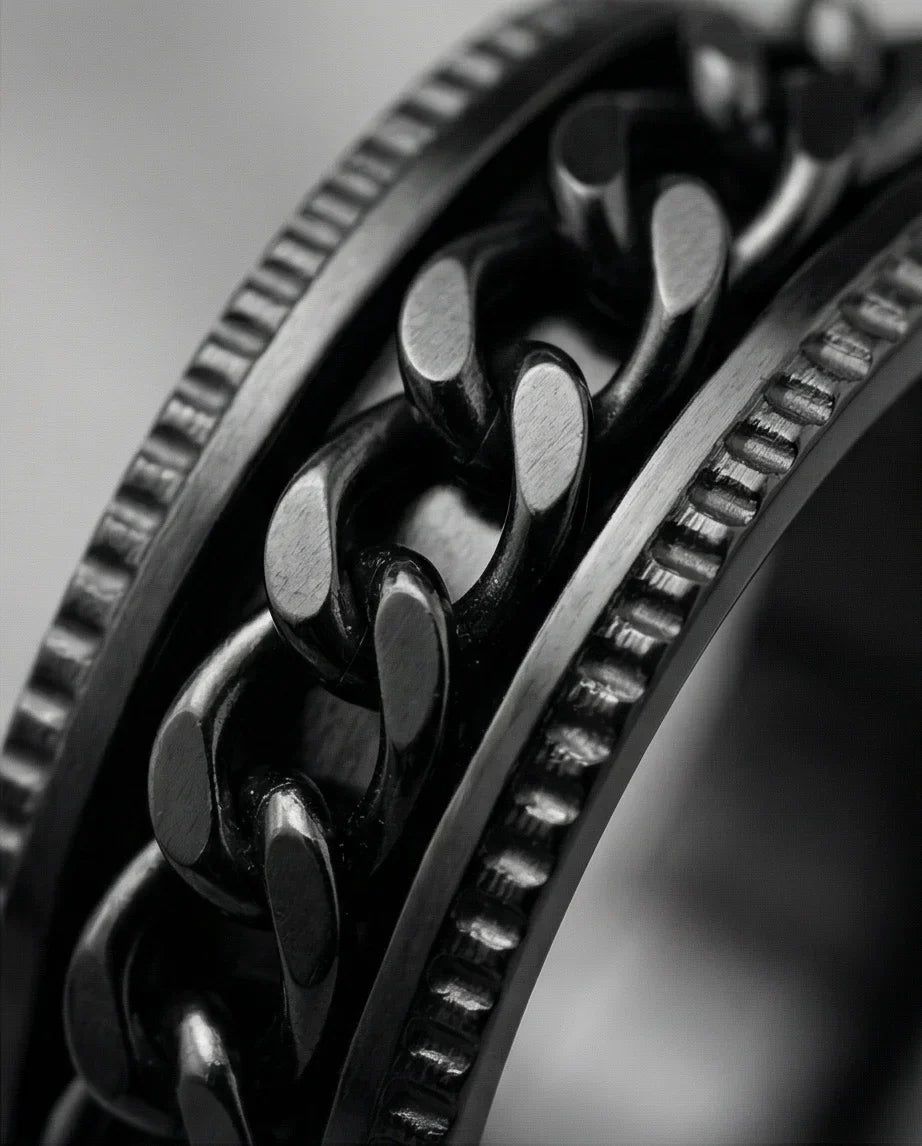 The Obsidian Kinetic: Industrial Chain Spinner Band