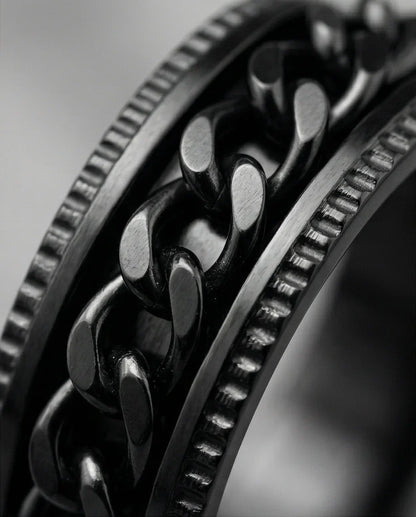 The Obsidian Kinetic: Industrial Chain Spinner Band