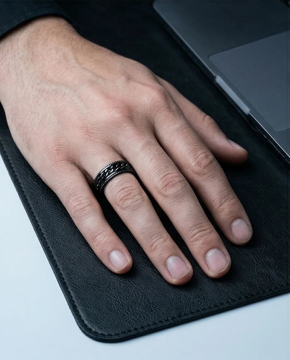 The Obsidian Kinetic: Industrial Chain Spinner Band