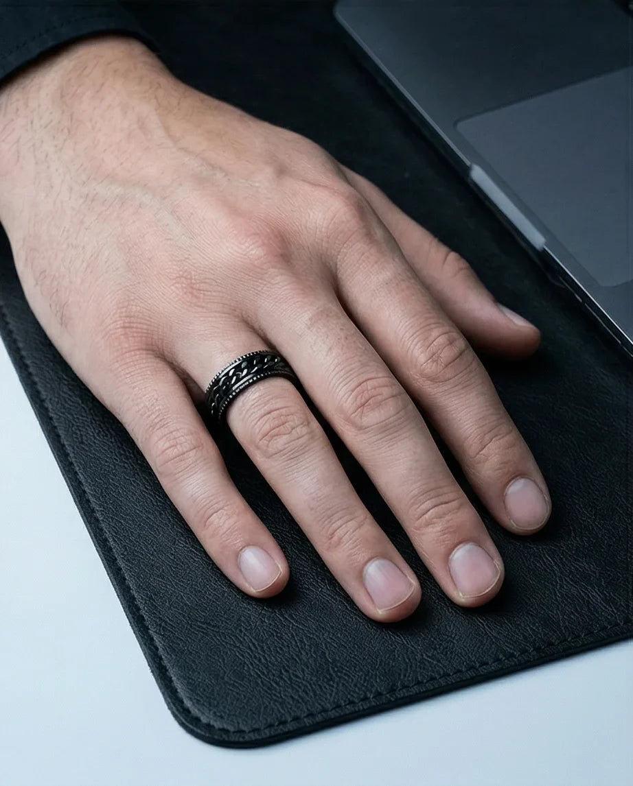The Obsidian Kinetic: Industrial Chain Spinner Band