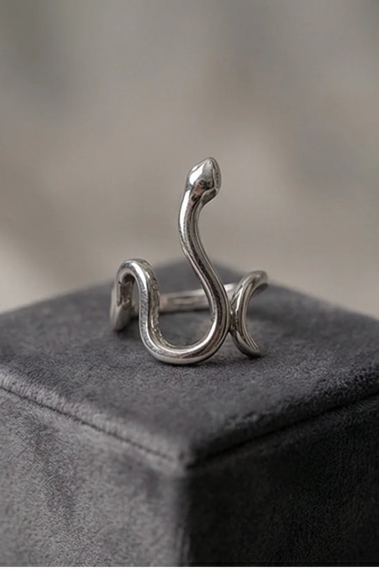 Silver Coil: Sleek Sculptural Serpentine Ring