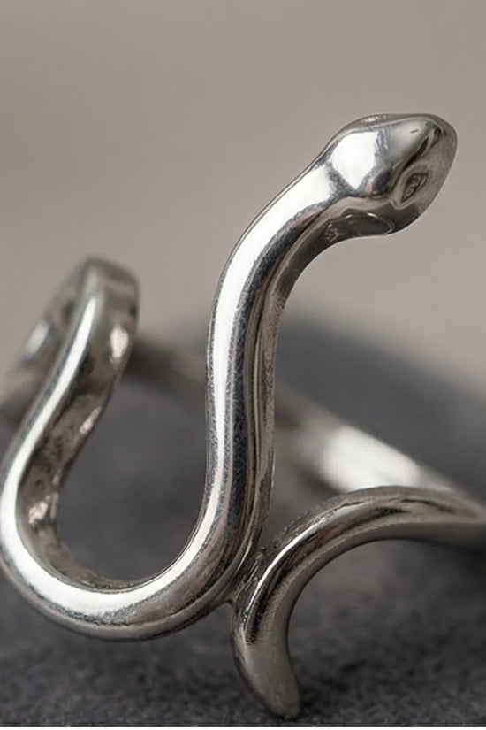Silver Coil: Sleek Sculptural Serpentine Ring