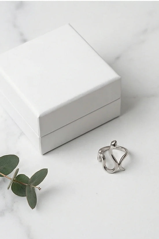 Silver Coil: Sleek Sculptural Serpentine Ring
