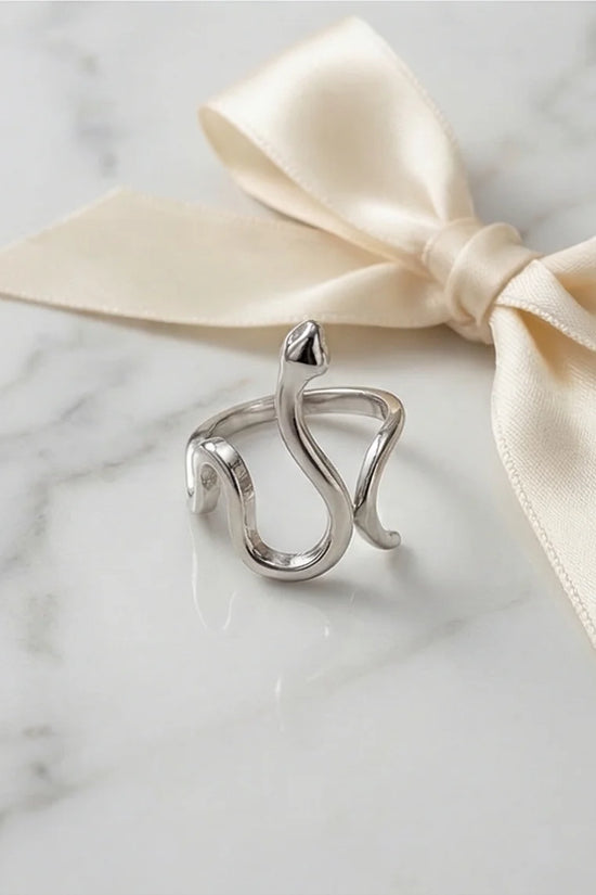 Silver Coil: Sleek Sculptural Serpentine Ring