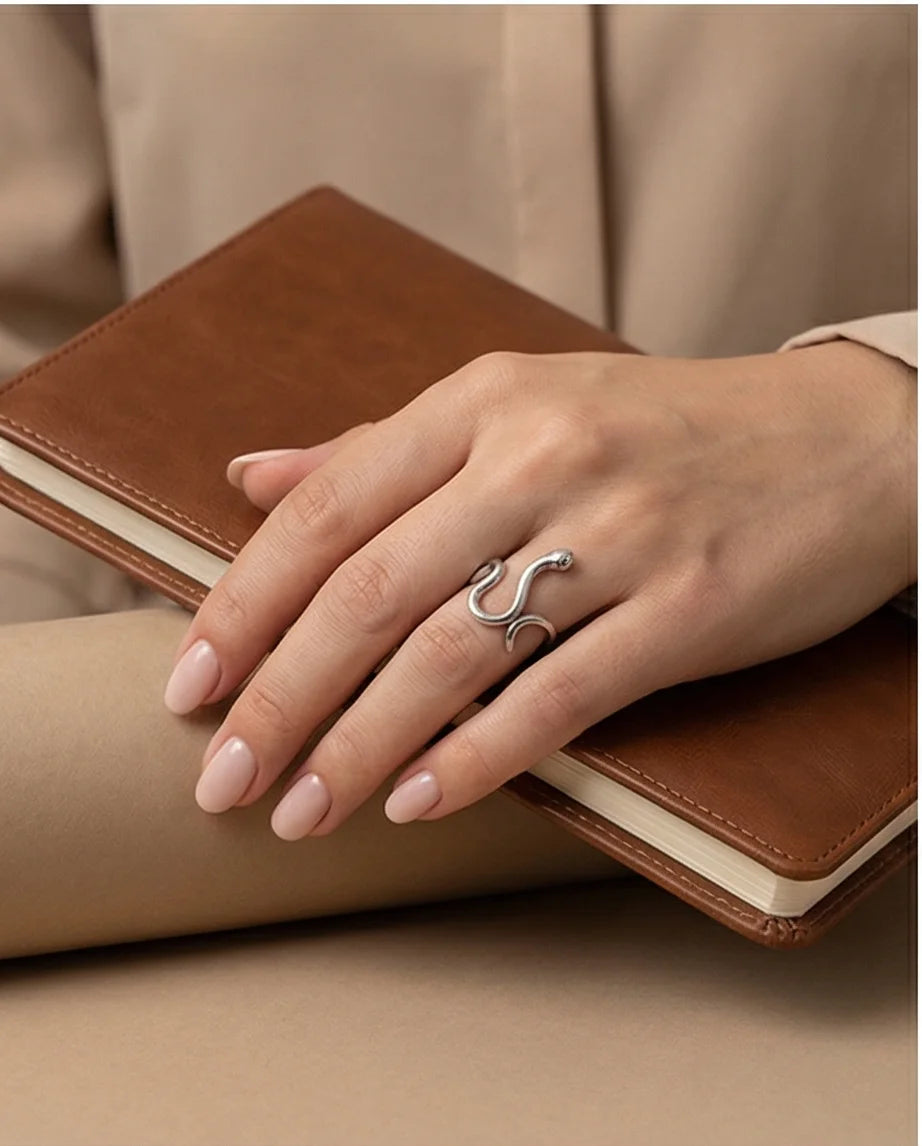 Silver Coil: Sleek Sculptural Serpentine Ring
