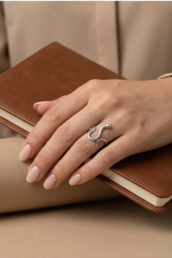 Silver Coil: Sleek Sculptural Serpentine Ring